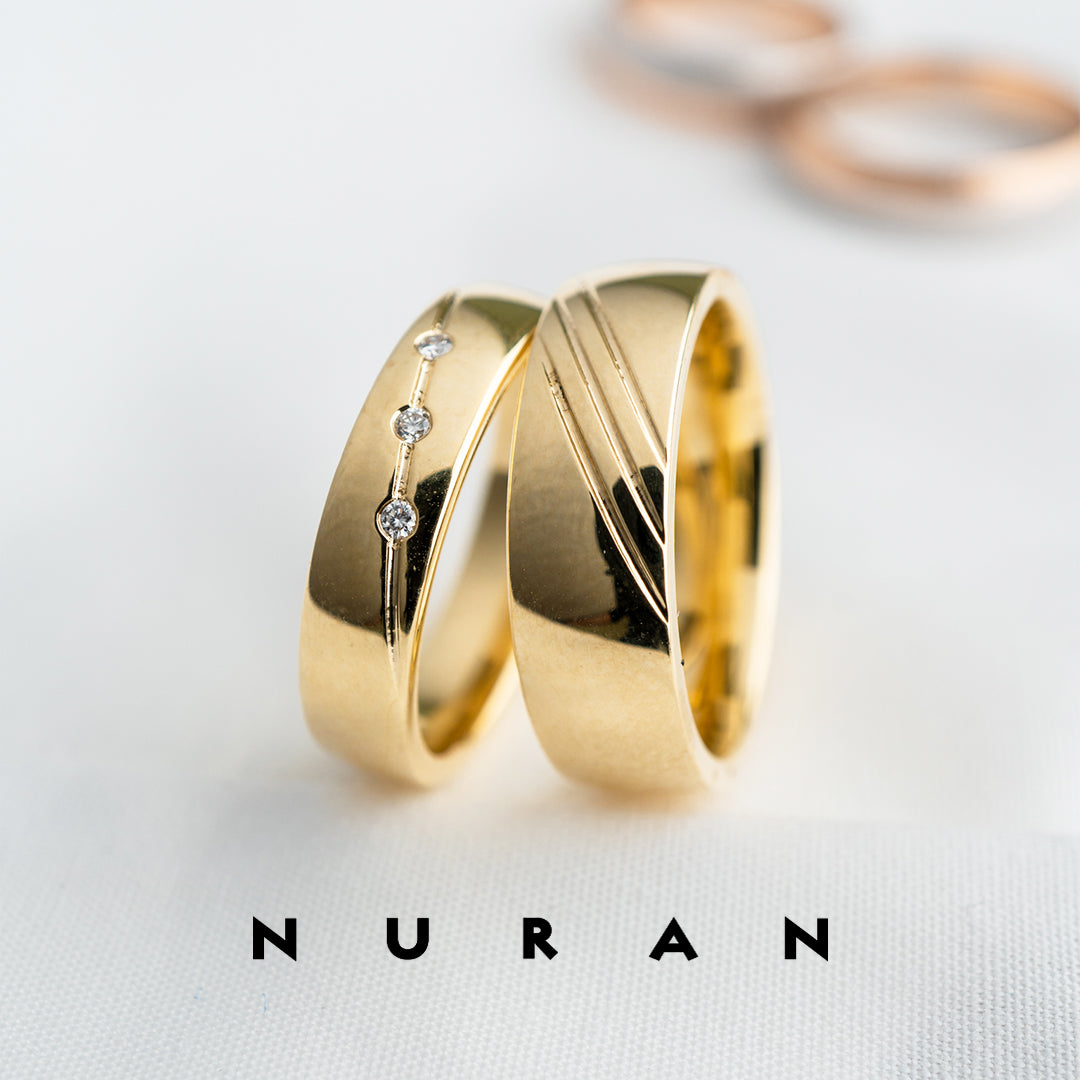 Guldsmed Norup forhandler Nuran vielsesringe i 8 og 14 karat - kom ind i butikken